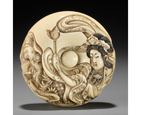 KIKUGAWA RYUKOKU: AN INLAID IVORY MANJU NETSUKE OF A TENNINBy Kikugawa Ryukoku, signed Kikugawa Ryukoku saku 菊川流谷作Japan, Edo 