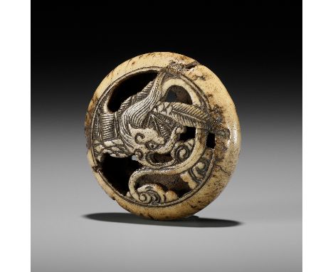 AN ANTLER RYUSA MANJU NETSUKE OF A RAIN DRAGONUnsignedJapan, Tokyo, Asakusa district, second half of the 19th centuryFinely c