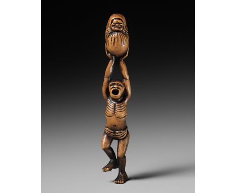 A POWERFUL WOOD NETSUKE OF A DANCING MAN WITH A DARUMA DOLLUnsignedJapan, Edo (Tokyo), late 18th century, Edo period (1615-18
