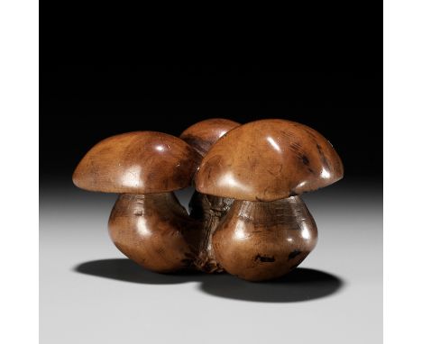 MINKO: A WOOD NETSUKE OF A CLUSTER OF MUSHROOMSBy Tanaka Juntoku Minko (1735-1816), signed Minko 岷江 and kakihanJapan, Tsu, la
