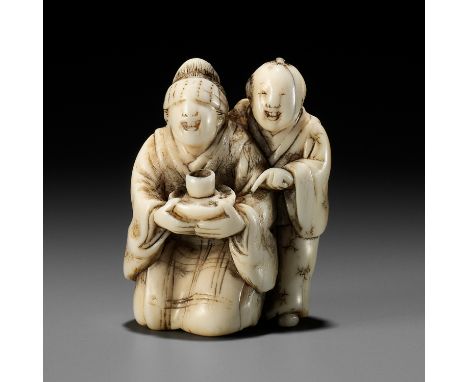 A RARE IVORY NETSUKE OF A BLINDFOLDED GEISHA WITH ATTENDANTUnsignedJapan, Edo (Tokyo), mid-19th century, Edo period (1615-186