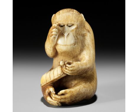 MASATOMO: AN AMUSING IVORY NETSUKE OF A SEATED MONKEY STUDYING A PEACH NETSUKEBy Masatomo, signed Masatomo 正友Japan, Tokyo, se