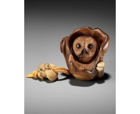 SERGEY OSIPOV: THE WATCHFUL OWLBy Sergey Osipov (b. 1968), signed with the artist's mark Russia, c. 2005-2006Amusingly carved