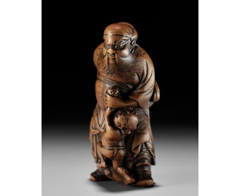 A FINE EARLY EDO SCHOOL WOOD NETSUKE OF SHOKI AND ONISigned Kazumasa saku 一正作Japan, Edo (Tokyo), c. 1800, Edo period (1615-18