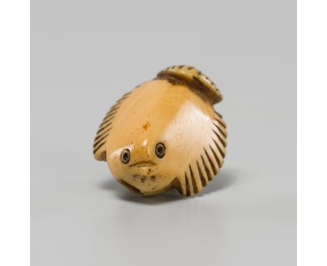 A FINE BONE OJIME OF THE FUKURA SUZUMEJapan, 19th centuryThe fat sparrow depicted in its classic form with short stubby wings