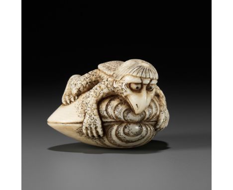 AN IVORY NETSUKE OF A KAPPA TRAPPED BY A HAMAGURI CLAMUnsignedJapan, early 19th century, Edo period (1615-1868)A finely carve