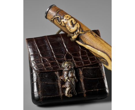 SOZAN: A FINE ANTLER KISERUZUTSU DEPICTING SHOKI AND ONI, WITH EN SUITE LEATHER POUCH WITH SHOKI KANAMONOBy Sozan, signed Soz