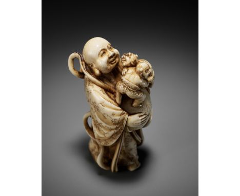 RYOZAN: AN AMUSING IVORY NETSUKE OF HOTEI WITH WRESTLING ONIBy Ryozan, signed Ryozan 良山Japan, Tokyo, second half of 19th cent