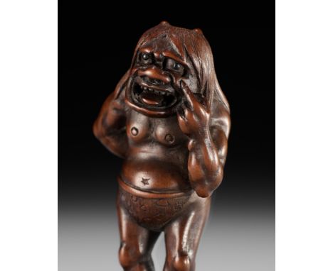 A SUPERB WOOD NETSUKE OF A MISCHIEVOUS ONI, ATTRIBUTED TO IKKYUAttributed to Ikkyu, unsignedJapan, Nagoya, 19th century, Edo 