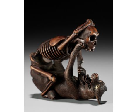 A FINE WOOD NETSUKE OF A WOLF AND SKELETON, ATTRIBUTED TO SHOKO SUGONOYAAttributed to Shoko Sugonoya, unsignedJapan, Takayama
