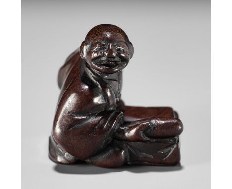 A FINE EDO SCHOOL WOOD NETSUKE OF FUKAI SHIDOKENUnsignedJapan, Edo (Tokyo), early 19th century, Edo period (1615-1868)Finely 