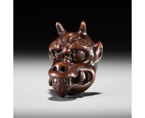 ICHIMISAI: A SUPERB AND LARGE WOOD MASK NETSUKE OF A DRAGON HEADBy Ichimisai, signed Ichimisai 一味斎Japan, Edo (Tokyo), late 18