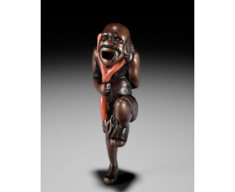 A POWERFUL WOOD NETSUKE OF A SOUTH SEA CORAL DIVERUnsignedJapan, 18th century, Edo period (1615-1868)Published: Joly, Henri L