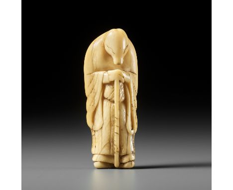 A FINE IVORY NETSUKE OF A FOX PRIEST (HAKUZOSU)UnsignedJapan, 18th century, Edo period (1615-1868)Beautifully worn, standing 