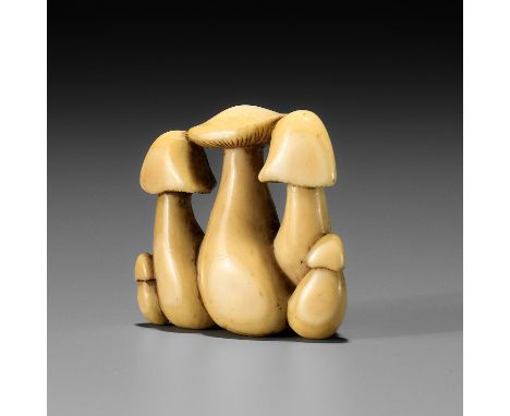YOSHITADA: A FINE IVORY NETSUKE OF A CLUSTER OF MUSHROOMSBy Yoshitada, signed Yoshitada 吉忠Japan, Kyoto, early 19th century, E