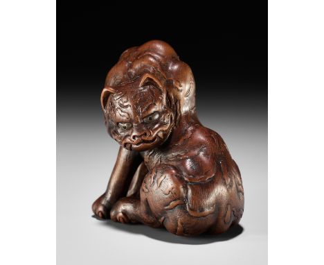 BART JANSZEN: TIGERBy Bart Janszen, signed with the artist's initials BJNetherlands, 2023Seated, the boxwood netsuke carved w