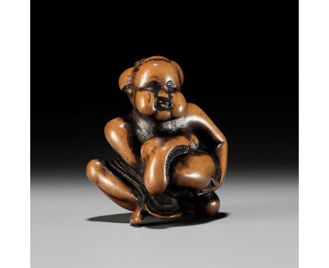 A WOOD SHUNGA NETSUKE OF OKAME CRADLING A HUGE MUSHROOMUnsignedJapan, early 19th century, Edo period (1615-1868)Finely carved