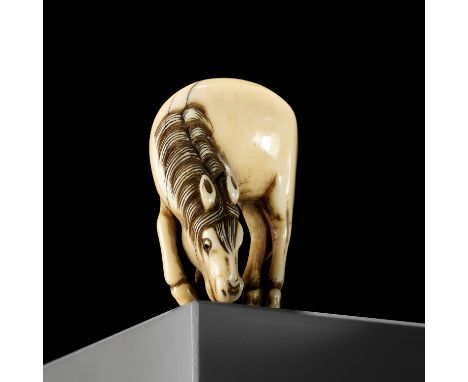 A FINE IVORY NETSUKE OF A GRAZING HORSEUnsignedJapan, c. 1820, Edo period (1615-1868)Finely carved as a grazing horse standin