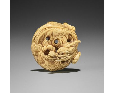 AN IVORY NETSUKE OF A COILED ONE-HORNED DRAGONUnsignedJapan, 18th century, Edo period (1615-1868)The dragon's sinuously windi