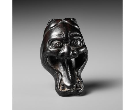 A LARGE AND UNUSUAL EBONY WOOD MASK NETSUKE OF HANNYAUnsignedJapan, 18th century, Edo period (1615-1868)Boldly carved, the fr