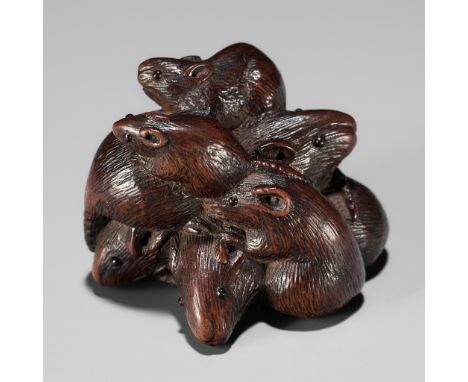 SARI: A FINE WOOD NETSUKE DEPICTING A MISCHIEF OF RATSBy Sari, signed Sari 左里Japan, Iwashiro province, c. 1800-1820, Edo peri