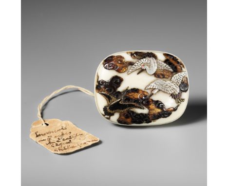 SHIBAYAMA: A FINE LACQUERED AND INLAID IVORY MANJU NETSUKE DEPICTING CRANES AND CLOUDSBy a member of the Shibayama family, si