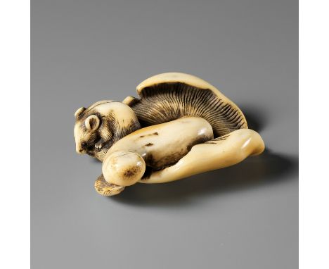 A FINE KYOTO SCHOOL IVORY NETSUKE OF A SQUIRREL ON MUSHROOMUnsignedJapan, Kyoto, late 18th century, Edo period (1615-1868)Fin