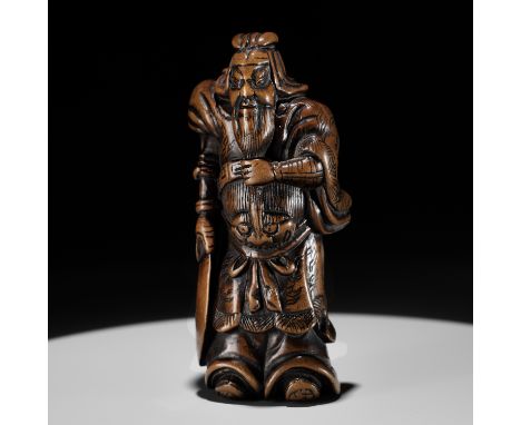 A POWERFUL WOOD NETSUKE OF KAN'U WITH HIS HALBERDUnsignedJapan, late 18th to early 19th century, Edo period (1615-1868)Boldly