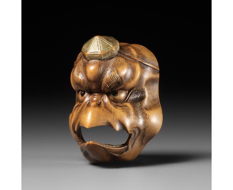 A PALE BOXWOOD MASK NETSUKE OF A KARASU TENGU, ATTRIBUTED TO KOKEISAI SANSHOAttributed to Kokeisai Sansho (1871-1936), unsign