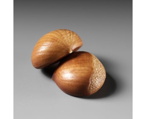 ANDO RYOKUZAN: A FINE LACQUERED IVORY NETSUKE OF TWO CHESTNUTSBy Ando Ryokuzan (1885-1959), signed Ryokuzan 緑山Japan, Tokyo, c