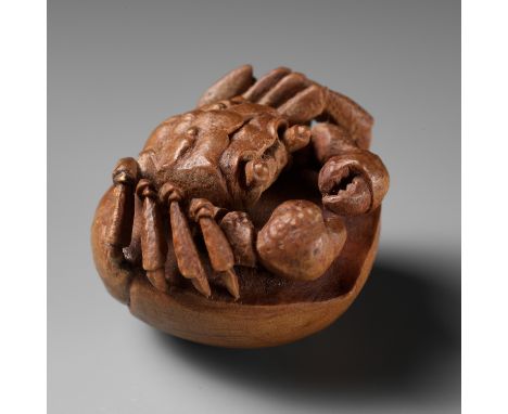 MORITA SOKO: A FINE NETSUKE OF A SAMURAI CRAB (HEIKEGANI) ON A CHESTNUTBy Morita Soko (1879-1942), signed Soko 藻己 to 刀Japan, 