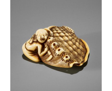 GARAKU: A SUPERB IVORY NETSUKE OF A FISHER GIRL WITH GIANT AWABIBy Risuke Garaku, signed Garaku 我樂Japan, Osaka, late 18th cen