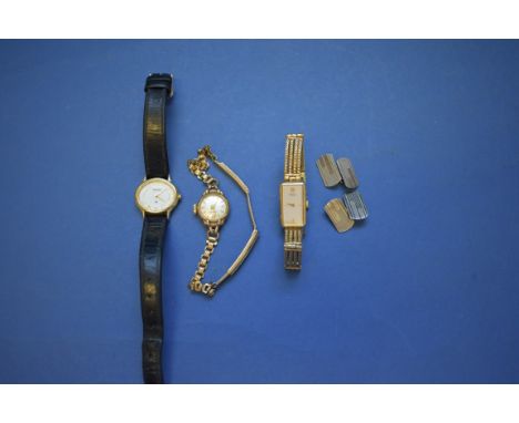 AÊ9ct gold ladies wrist watch; together with two other ladies wristwatches; and a pair of silver engine turned cufflinks. 