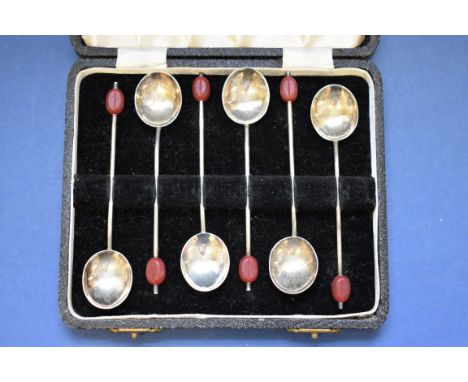 A silver twin handled bowl,&nbsp;by William Hutton &amp; Sons Ltd,&nbsp;Birmingham 1910; together with other silver items, 18