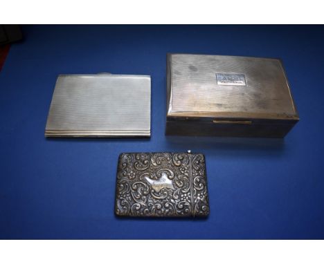 A silver embossed card case, by Henry Matthews,&nbsp;Birmingham 1913, 9cm; together with a silver engine turned cigarette cas
