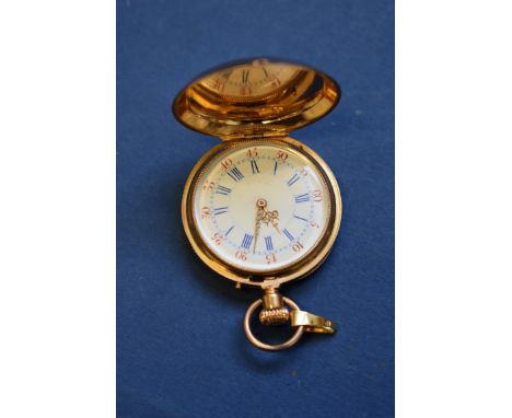 An unmarked Swiss fob watch, by B. Poitervin, the white enamel dial having red and blue numerals. 