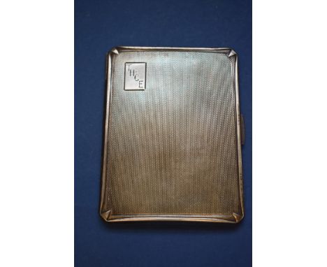 A silver engine turned cigarette case,&nbsp;by S &amp; B,&nbsp;Birmingham 1949, 11cm, 150g. 