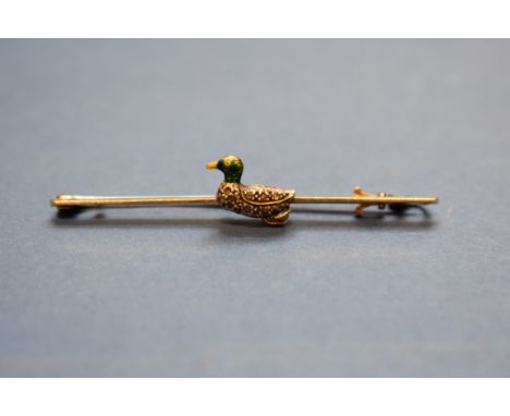 A 15ct gold bar brooch set platinum and enamel Mallard duck. 