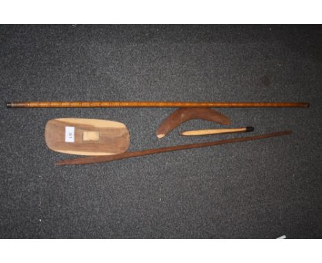 AN ABORIGINAL SPEAR, MINIATURE CLUB, SHIELD AND BOOMERANG, TOGETHER WITH A YARD STICK (5)