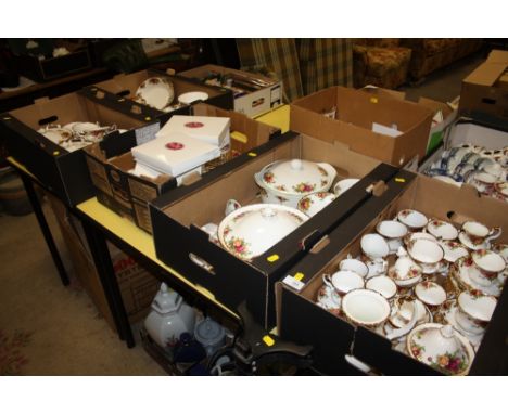 A LARGE COLLECTION OF ROYAL ALBERT OLD COUNTRY ROSES CHINA TO INCLUDE TEA AND COFFEE POTS, COFFEE CANS, CUPS, SAUCERS, DINING