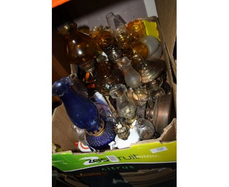 A COLLECTION OF VINTAGE OIL LAMPS SHADES, FLUES ETC.