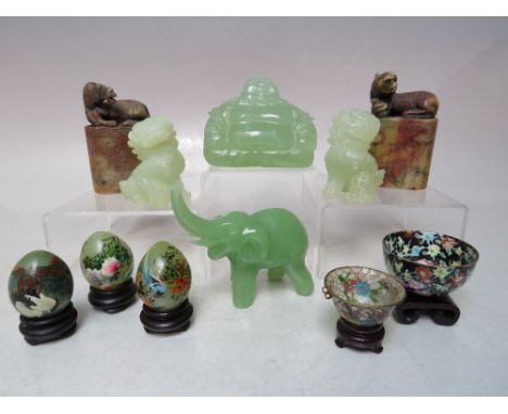 A COLLECTION OF 20TH CENTURY ORIENTAL FIGURES ETC., to include a pair of carved modern jade dogs of fo, two carved seals with