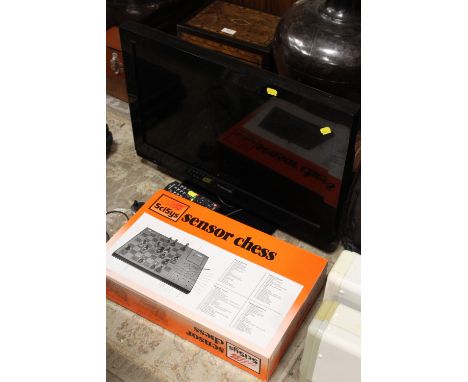 A PANASONIC TV WITH REMOTE PLUS A BOXED SCISYS ELECTRIC CHESS SET