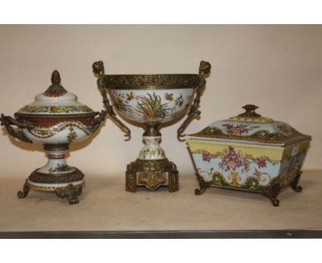 A MODERN REPRODUCTION BRASS AND CERAMIC TWIN HANDLED CENTRE PIECE TOGETHER WITH A SIMILAR LIDDED BOWL ON STAND AND A LIDDED C