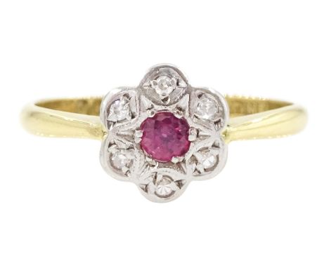 Early - mid 20th century gold ruby and diamond cluster ring, stamped 18ct PlatCondition Report:Approx 2.1gm, size M, diameter