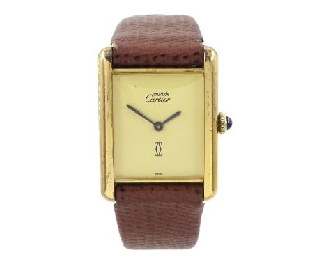 Must de Cartier Tank silver-gilt manual wind wristwatch, cream dial, hallmarked, on brown leather strapCondition Report:Movem