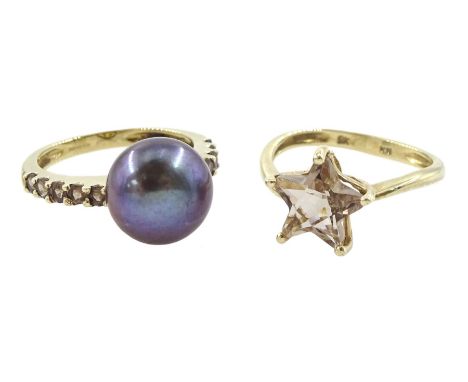 Gold single stone smokey quartz star ring and a gold grey / purple pearl ring, with smokey quartz shoulders, both hallmarked 