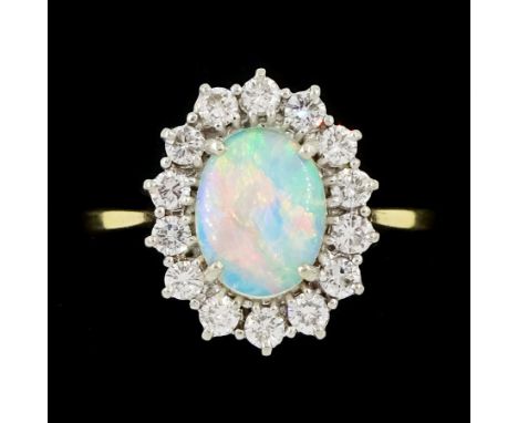 18ct gold opal and round brilliant cut diamond cluster ring, London import mark 1981, opal approx 0.70 carat, total diamond w