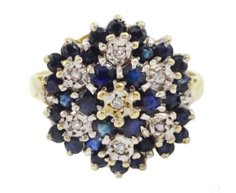 18ct gold round cut sapphire and illusion set diamond cluster ring, London 1979Condition Report:Approx 5.95gm, size P-Q, max 