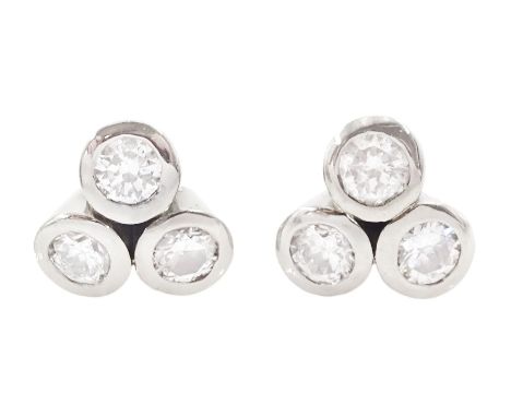 Pair of white gold bezel set, round brilliant cut diamond cluster stud earrings, total diamond weight approx 0.65 caratCondit